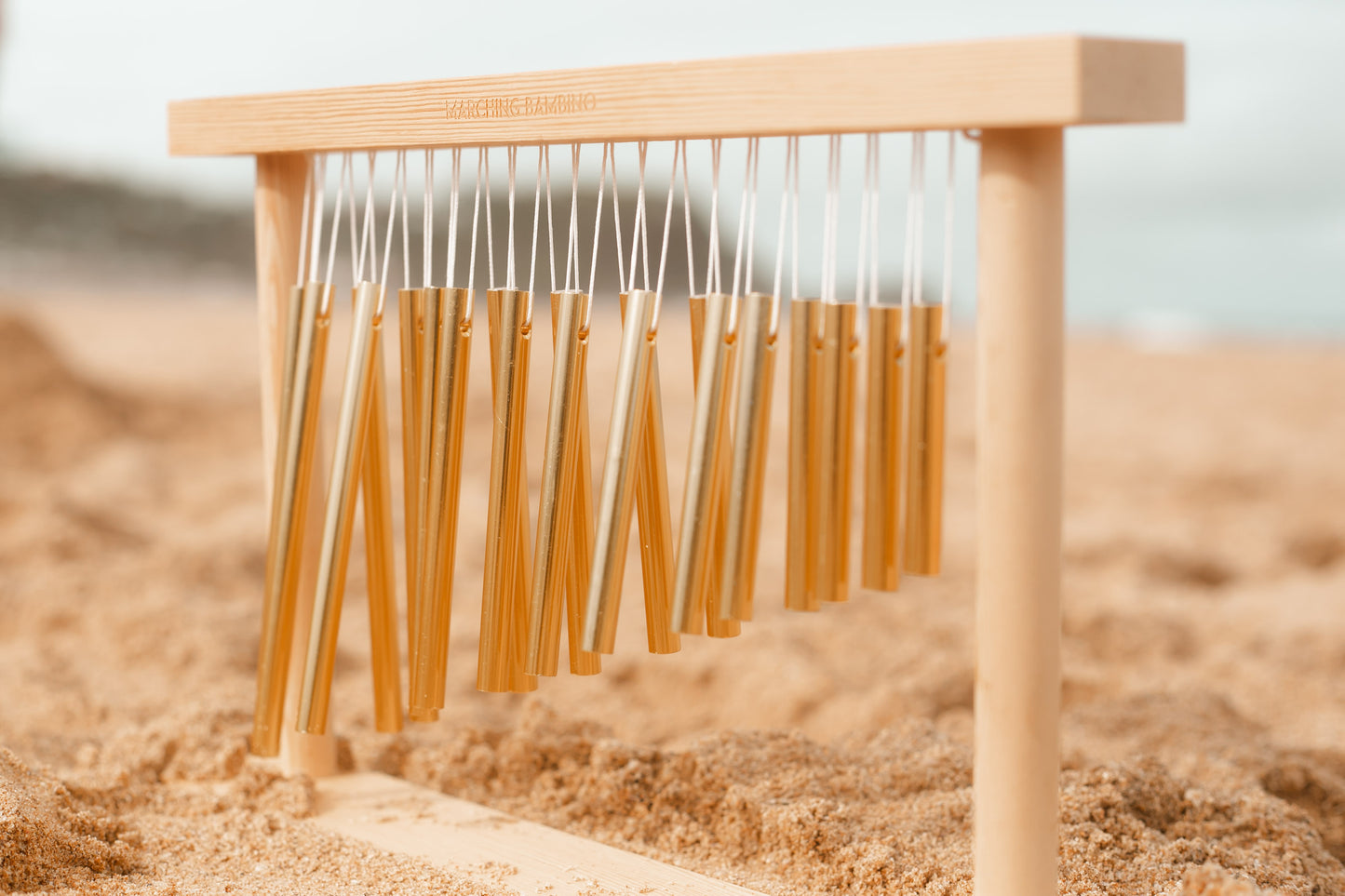 marching bambino music chime bar gold