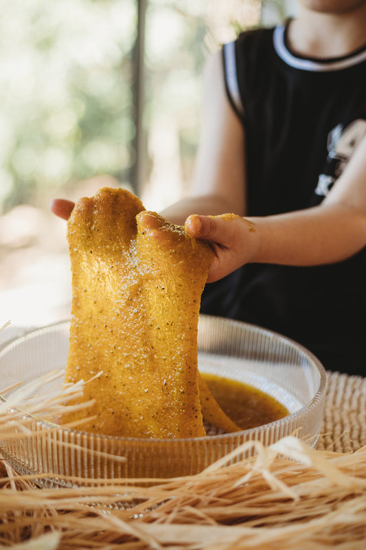 angler fish puke is a disgustingly gooey natural taste safe slime made from psyllium. yellow ocean goo from the saltwater collective for sensory play