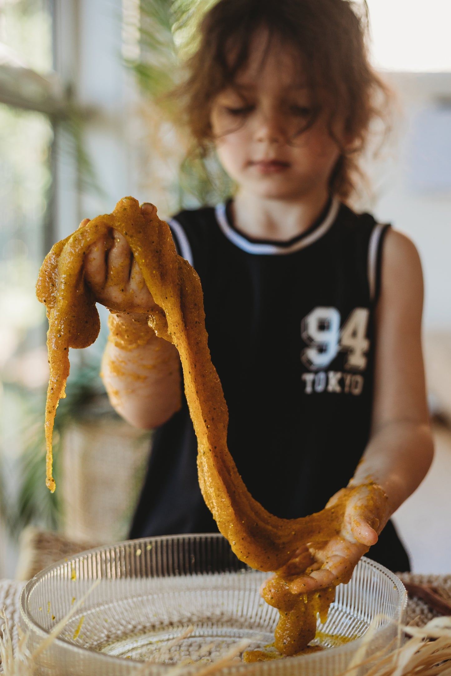angler fish puke is a disgustingly gooey natural taste safe slime made from psyllium. yellow ocean goo from the saltwater collective for sensory play for kids