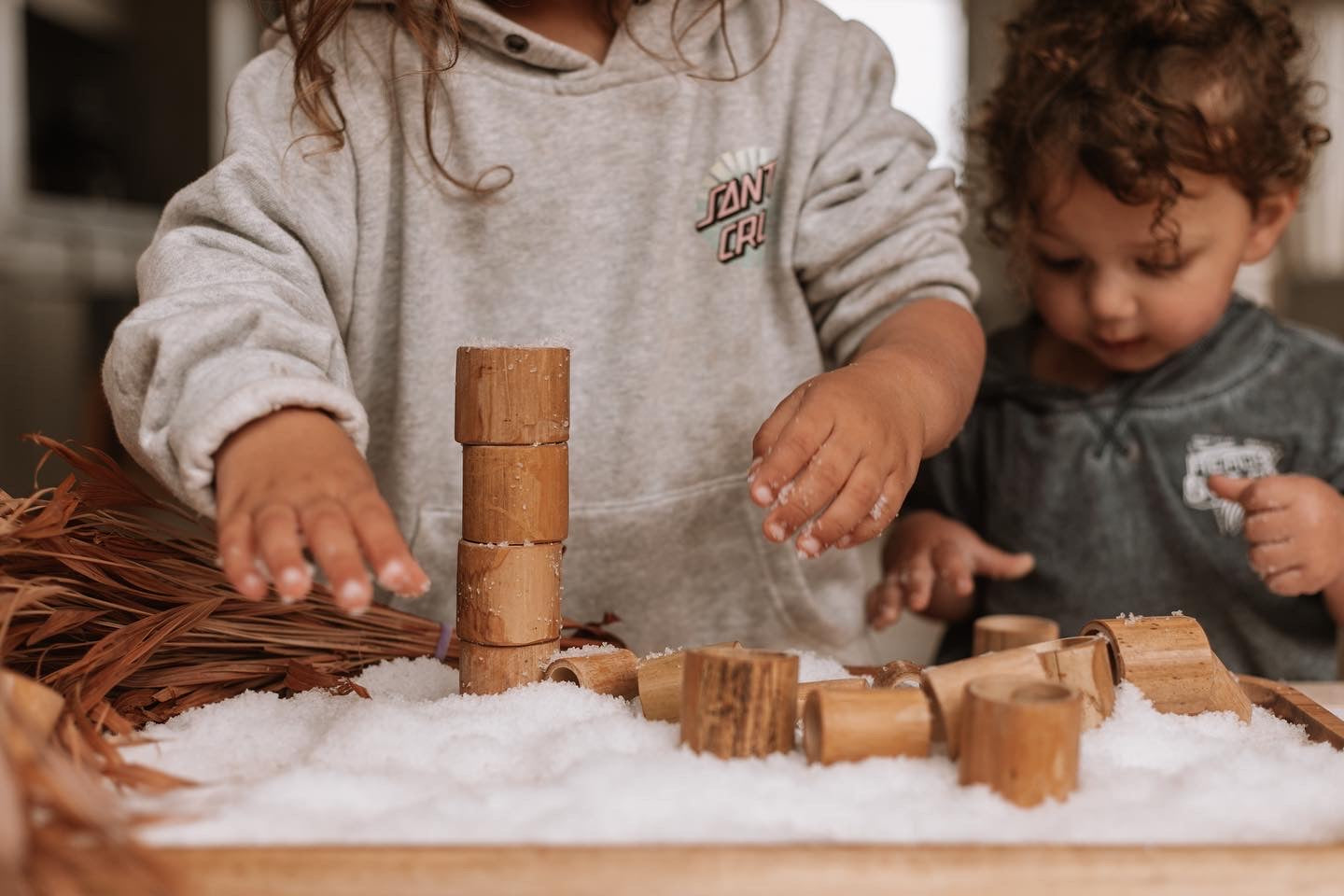 snowflakes white instant snow. winter play with bamboo tubes